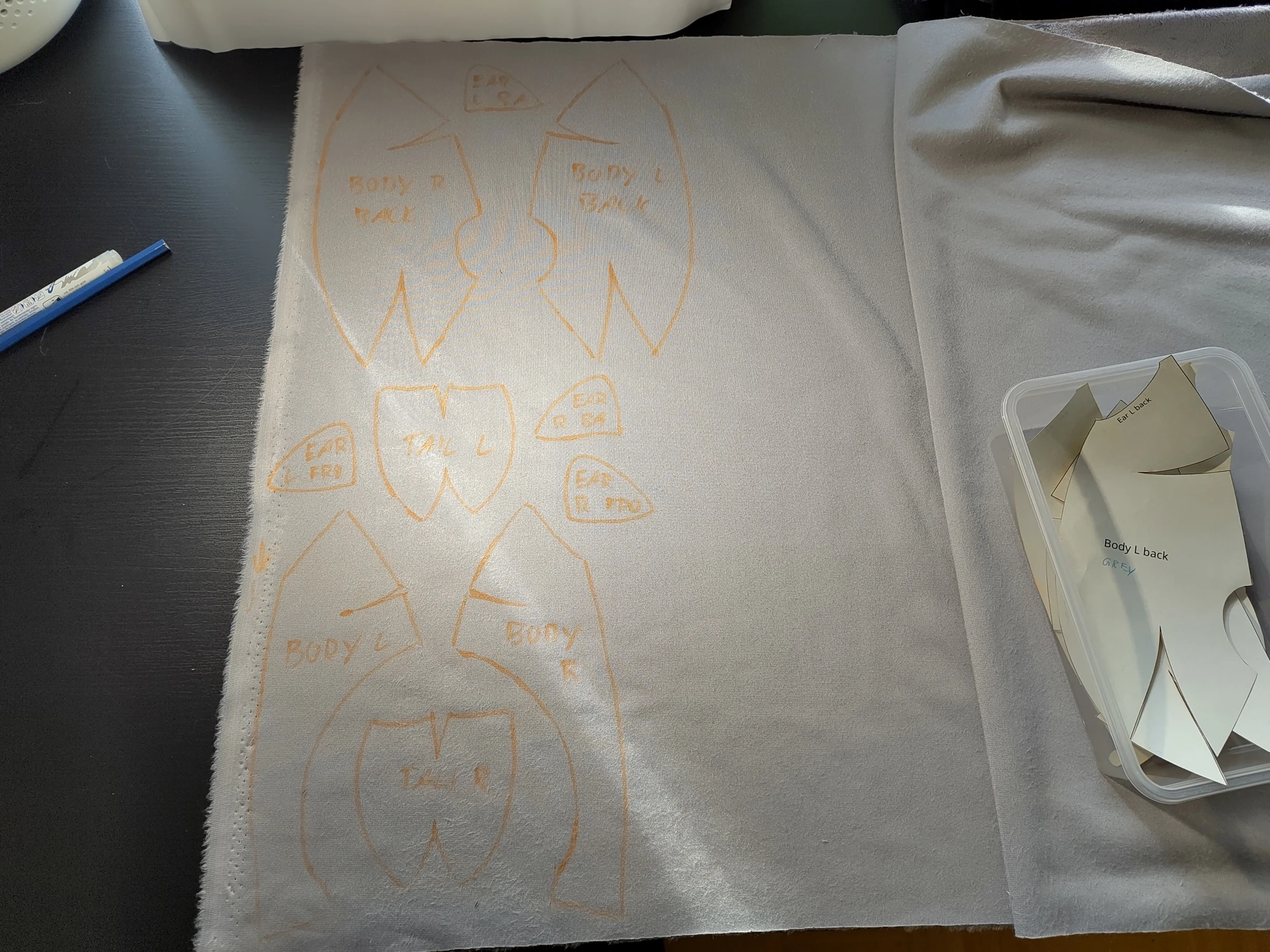 A sewing pattern drawn on the backside of a fabric.
