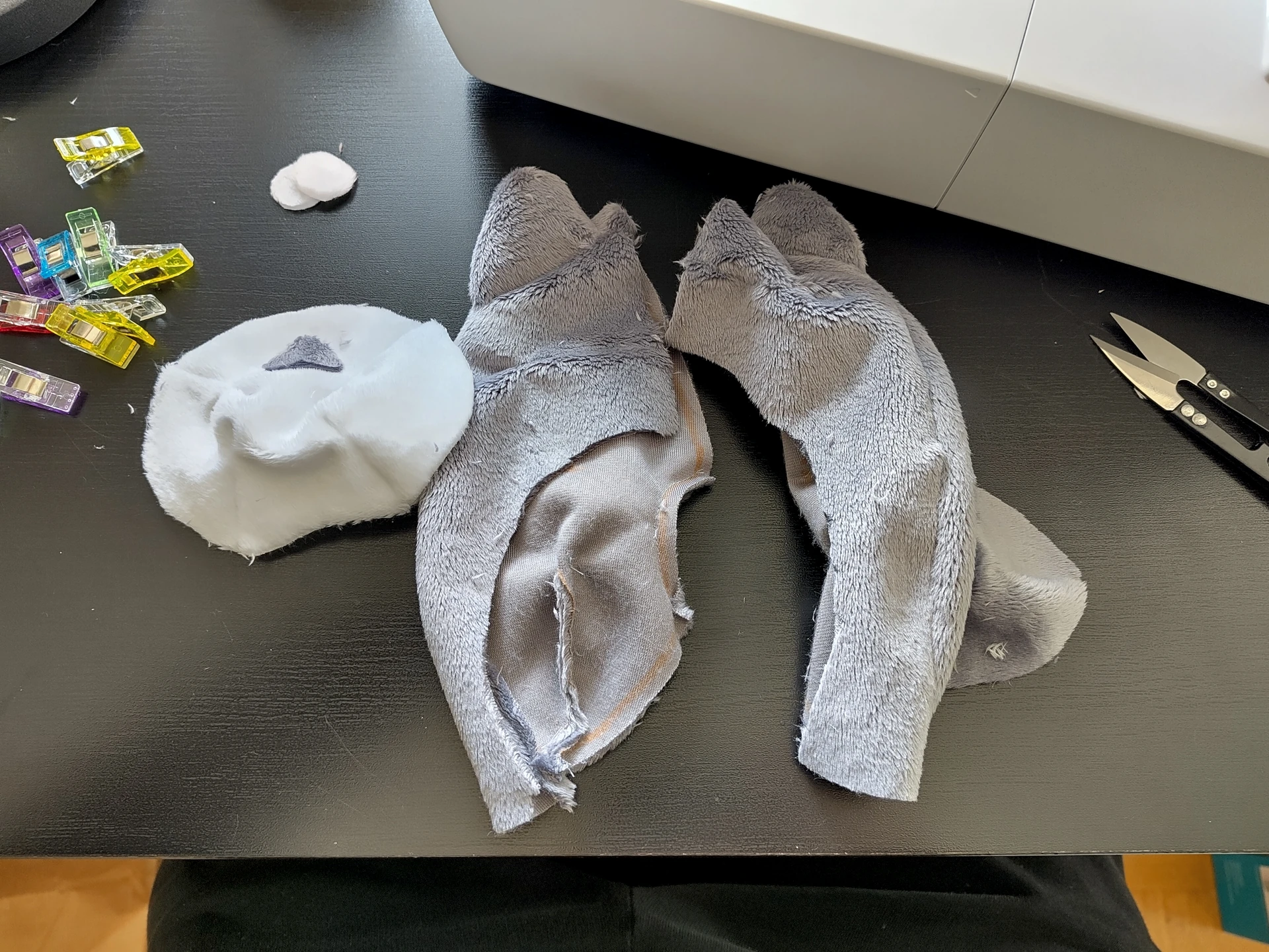 A partially assembled plushie, the markings on the chest are about to be added.